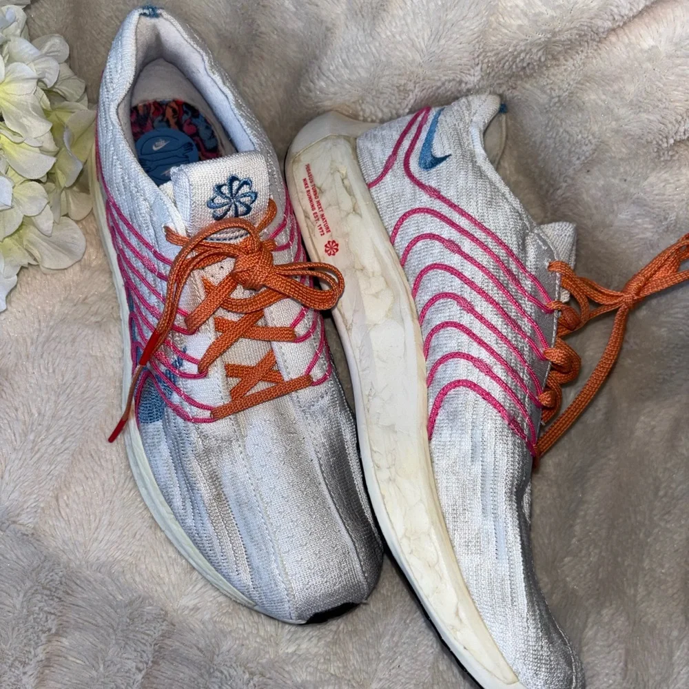 Nike Women's White Running Shoes with Pink, Blue & Orange Accents size 10.5